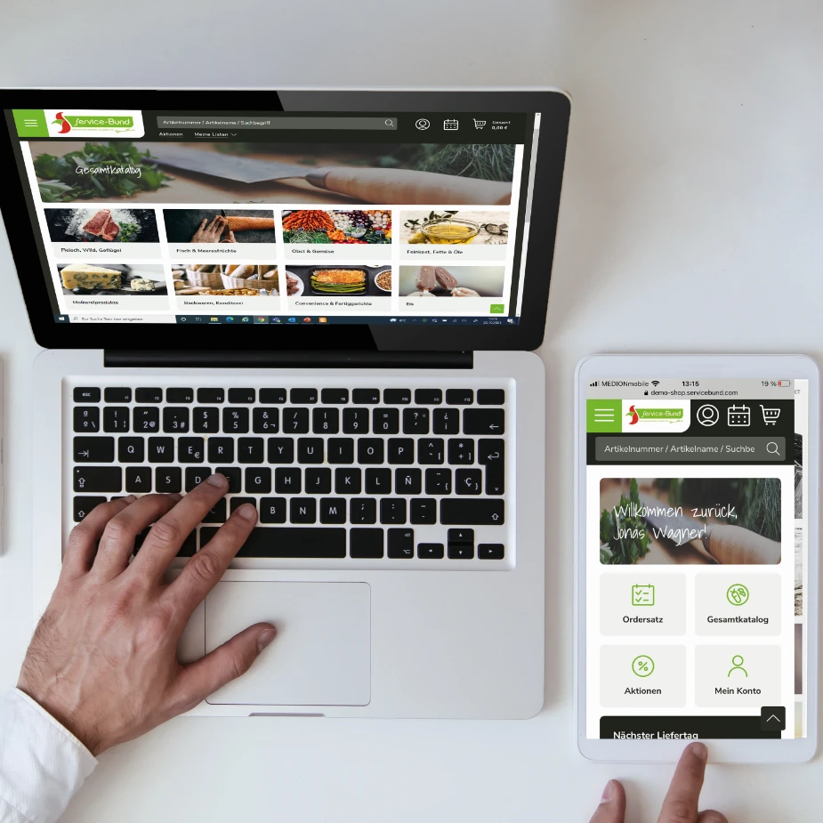 WebShop Ein Laptop und ein Smartphone haben Zugriff auf den Webshop.